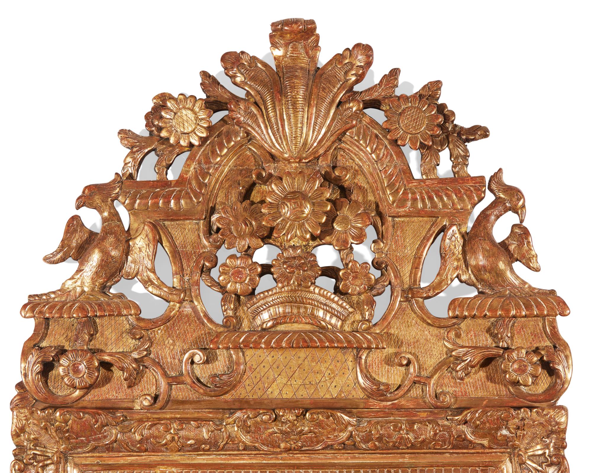 A Régence giltwood looking glass, circa 1720