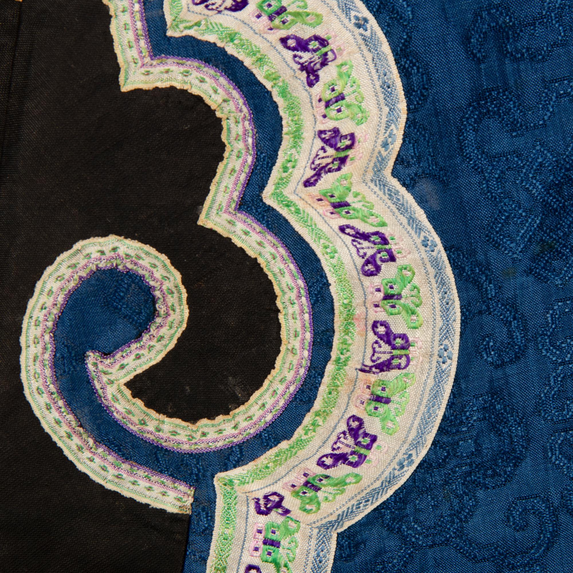 Two Chinese Blue Ground Silk Robes, Late Qing Dynasty 清晚期 藍地盤金繡游龍瑞獸纹道袍及藍地織錦女褂