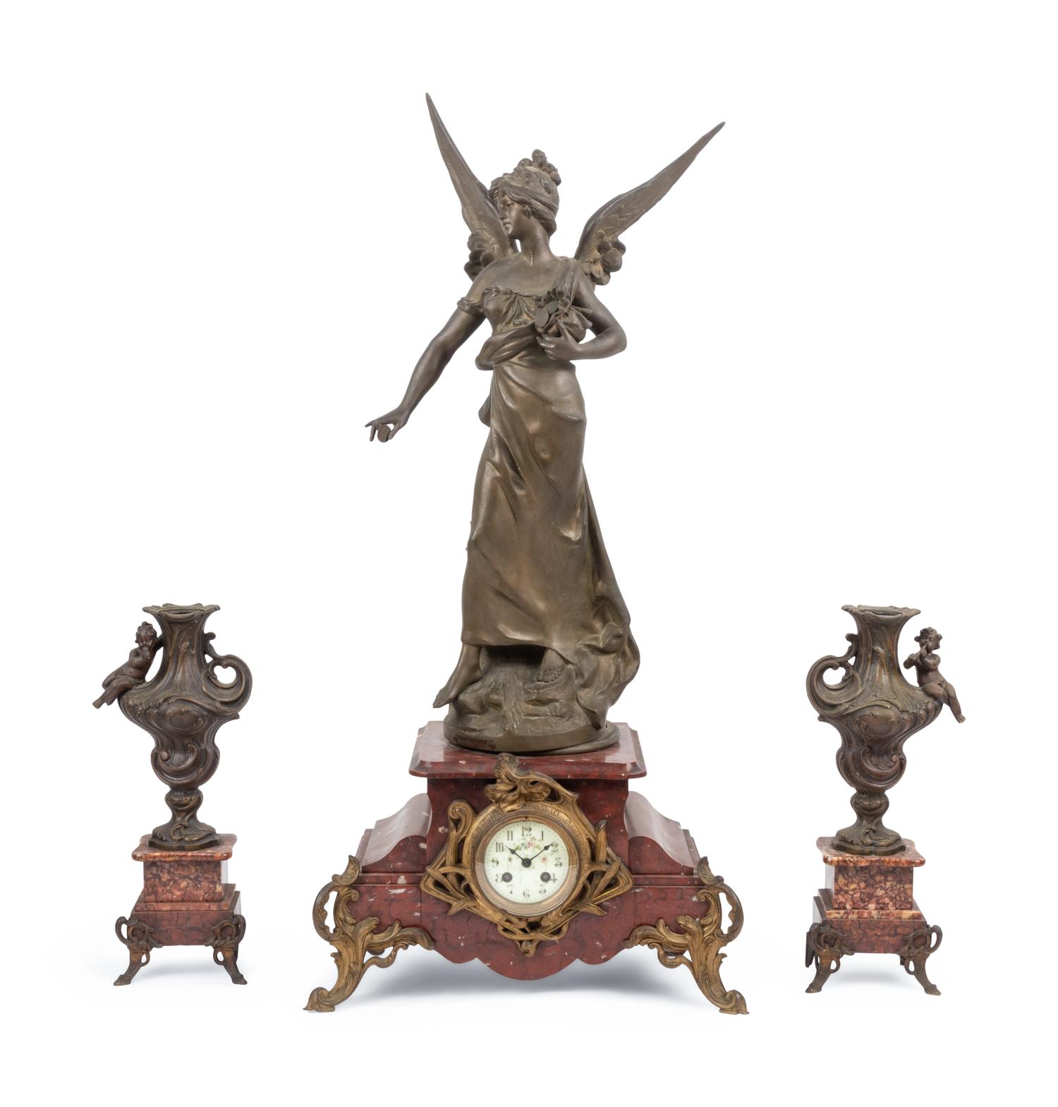 A French Cast Metal and Marble Clock Garniture
