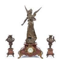 A French Cast Metal and Marble Clock Garniture