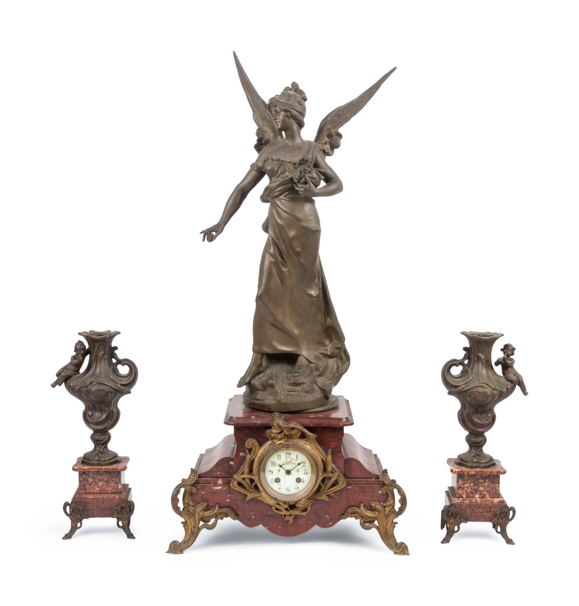 A French Cast Metal and Marble Clock Garniture