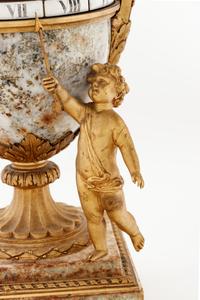 A Louis XVI Style Gilt Bronze and Marble Annular Clock