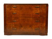An Art Deco Walnut Chest of Drawers — CIRCA 1930