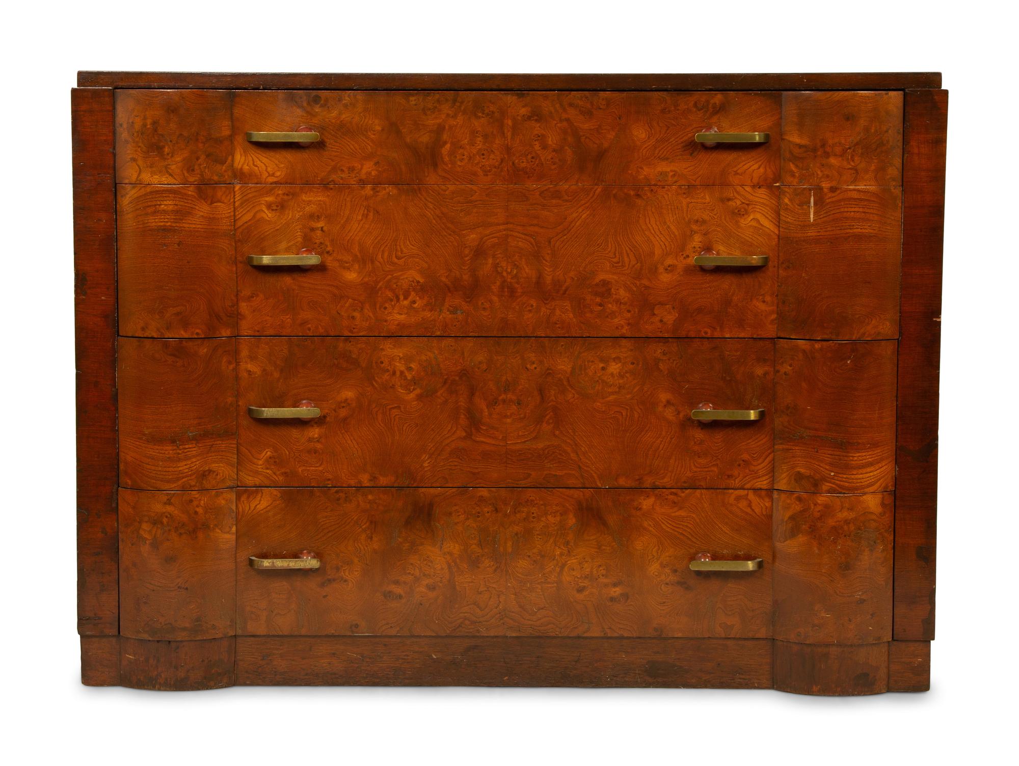 An Art Deco Walnut Chest of Drawers — CIRCA 1930