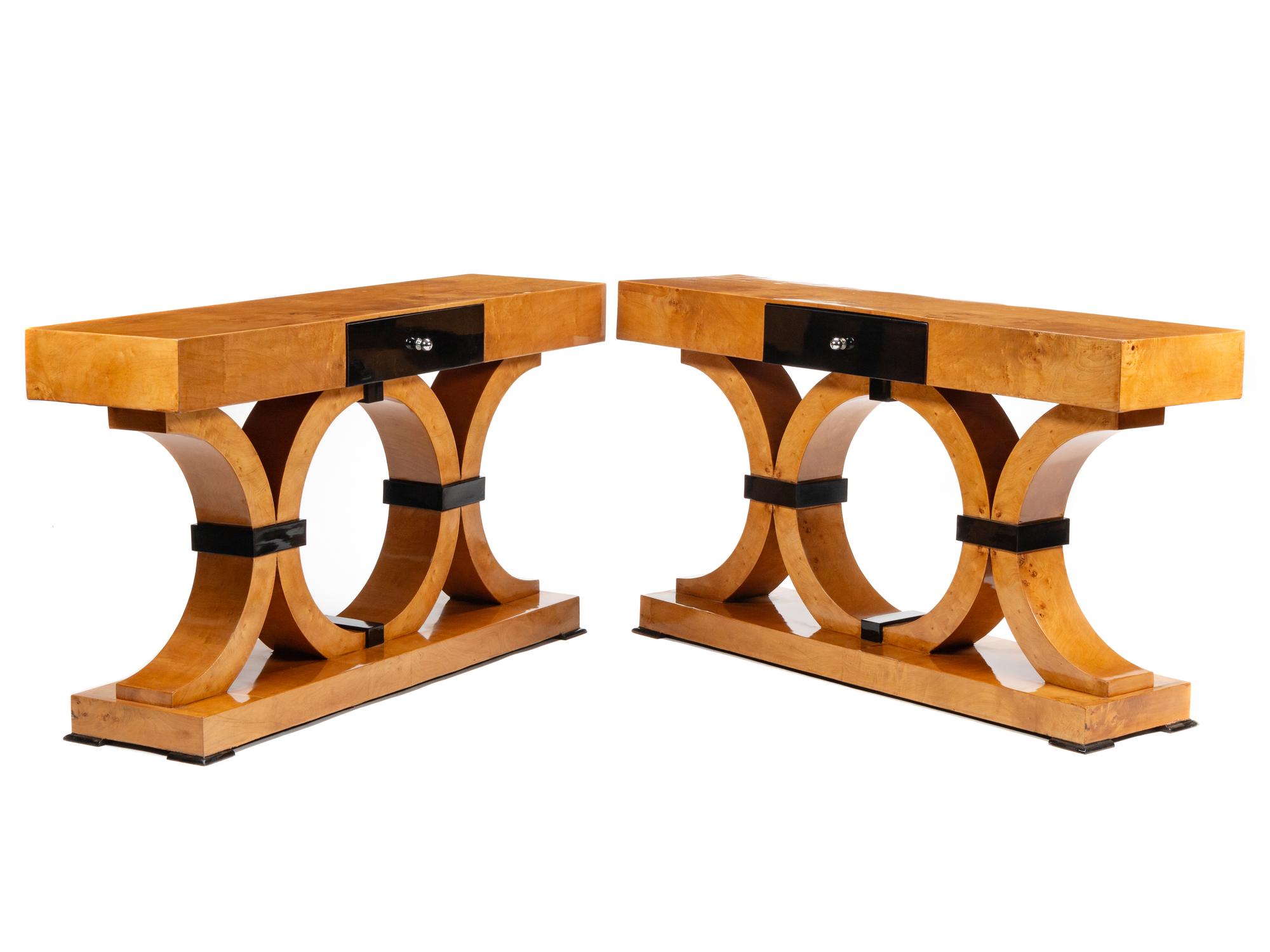 A Pair of Art Moderne Style Part Ebonized Birch Console Tables