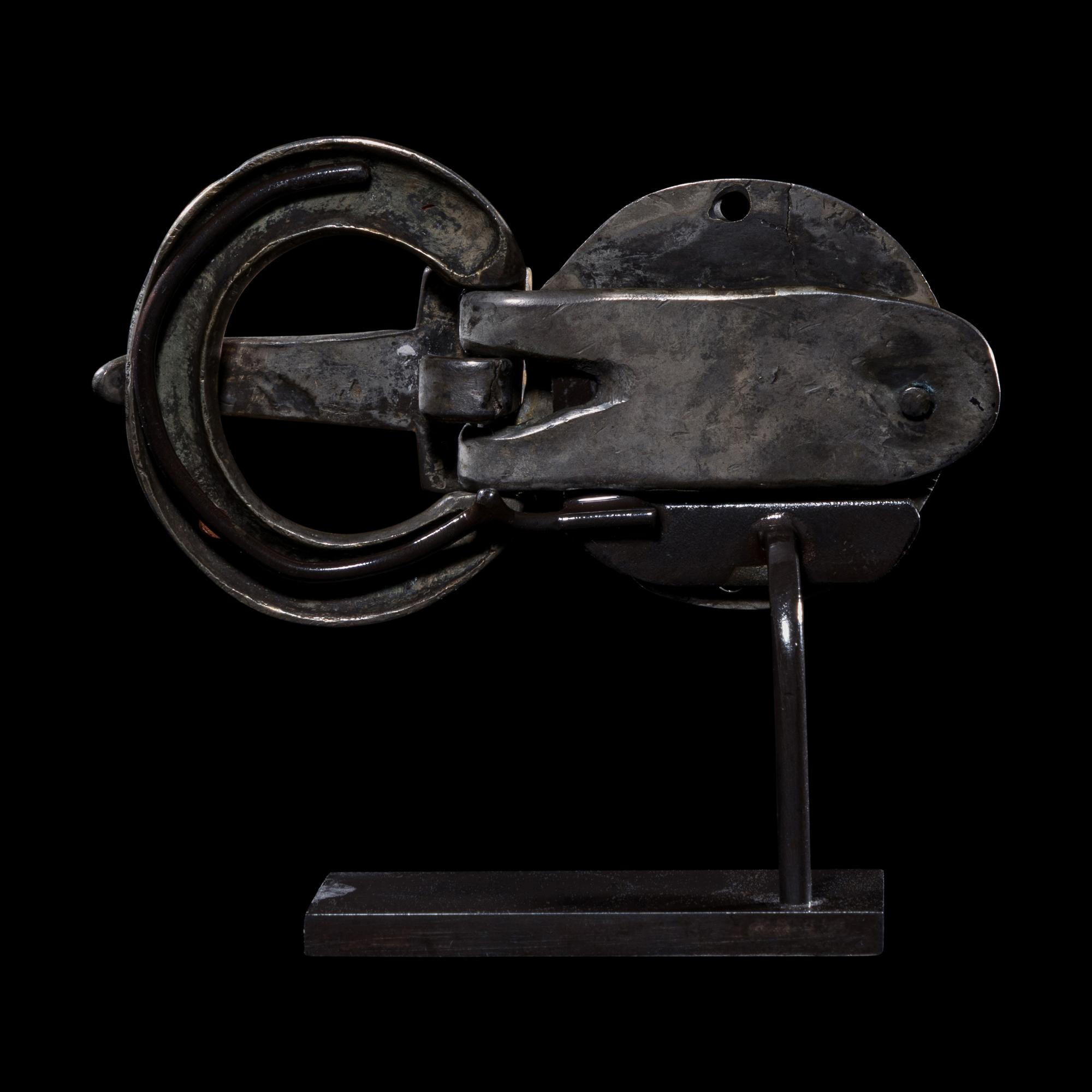 A Merovingian Gilt-Silver and Garnet Belt Buckle