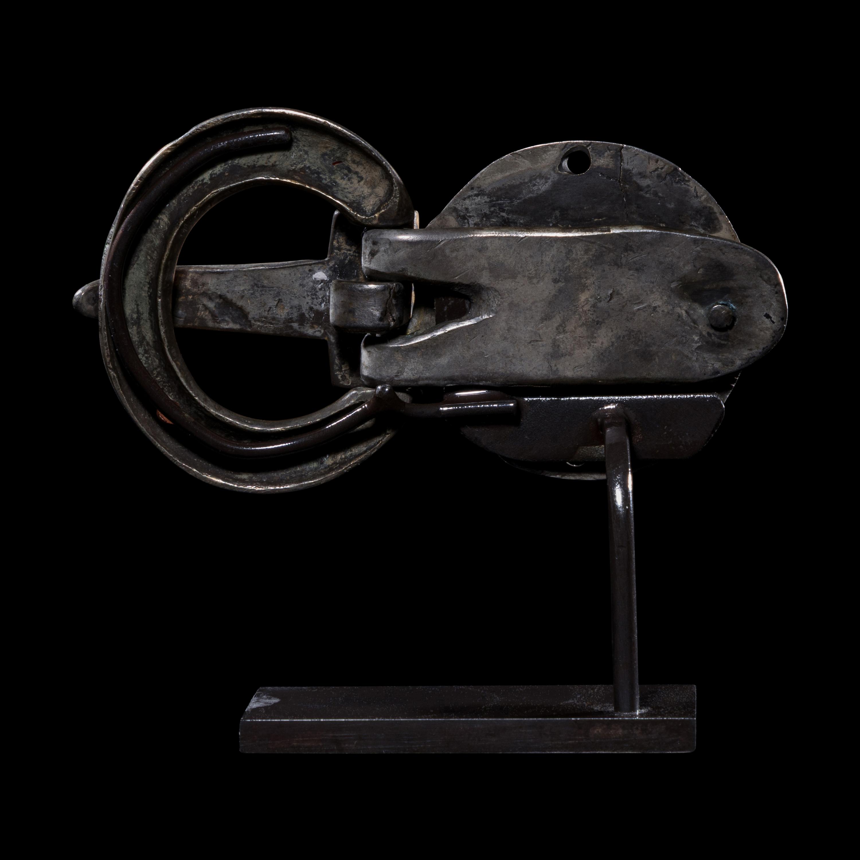 A Merovingian Gilt-Silver and Garnet Belt Buckle