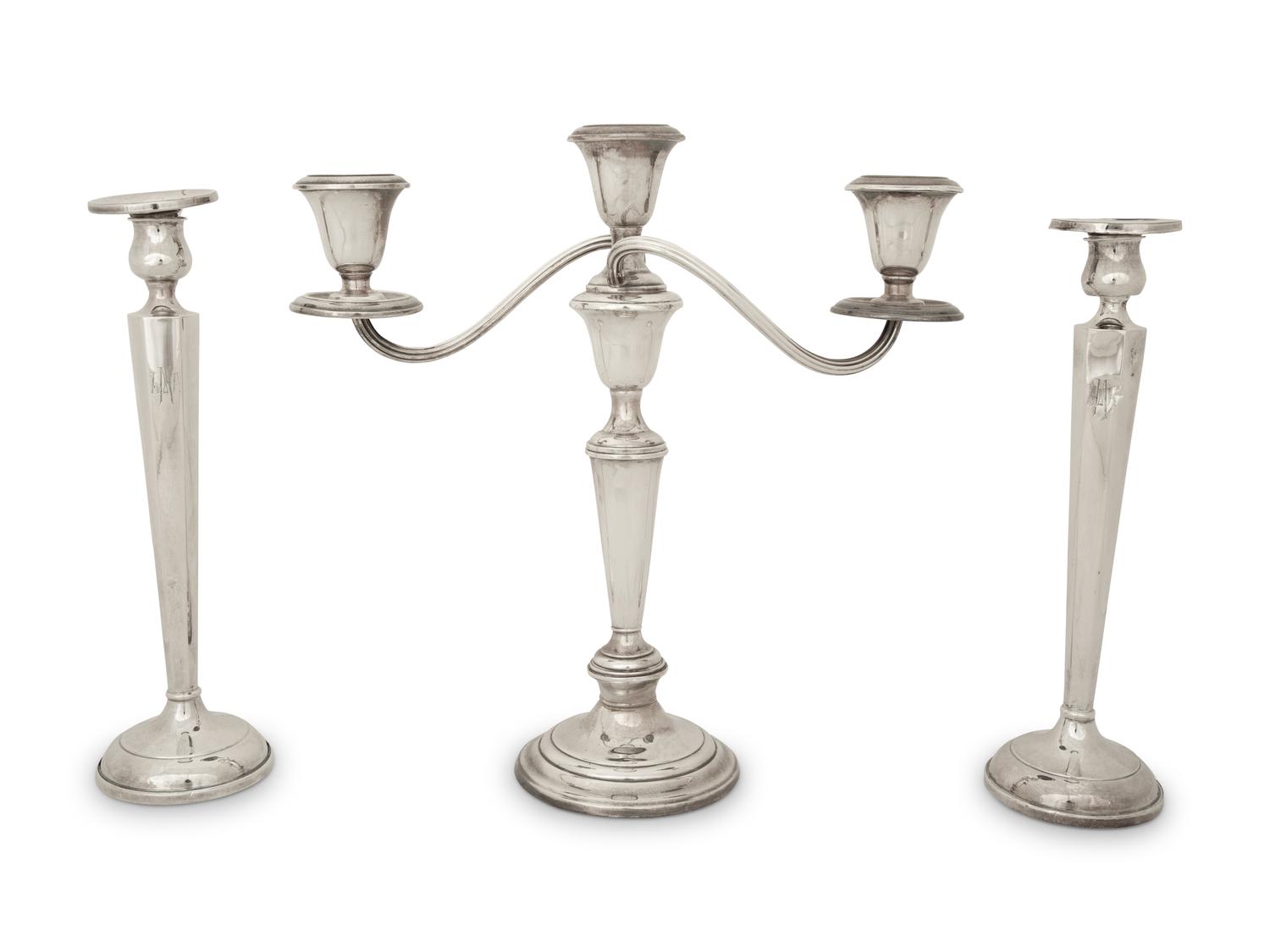 A Pair of American Silver Candlesticks and an American Silver Three Light Candelabrum