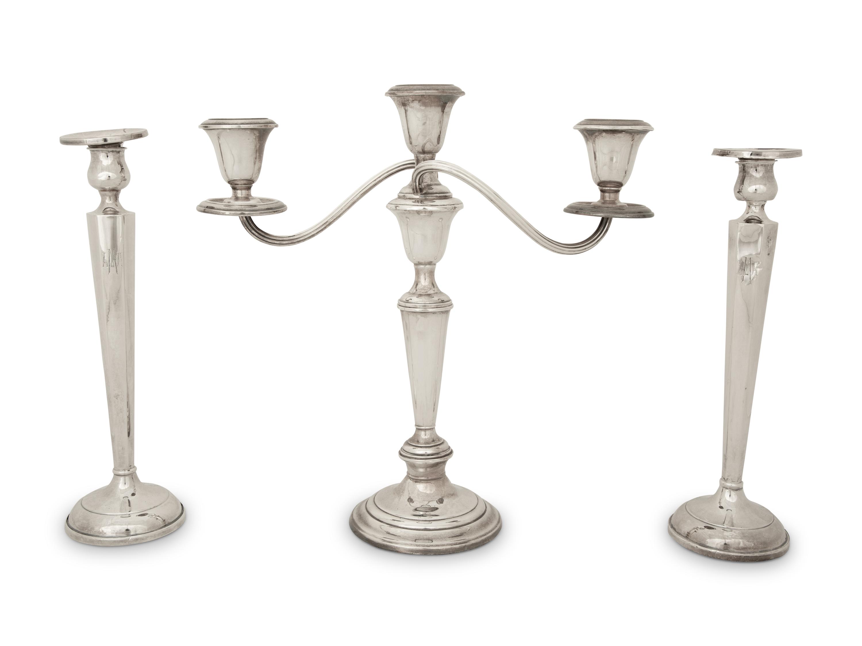 A Pair of American Silver Candlesticks and an American Silver Three Light Candelabrum