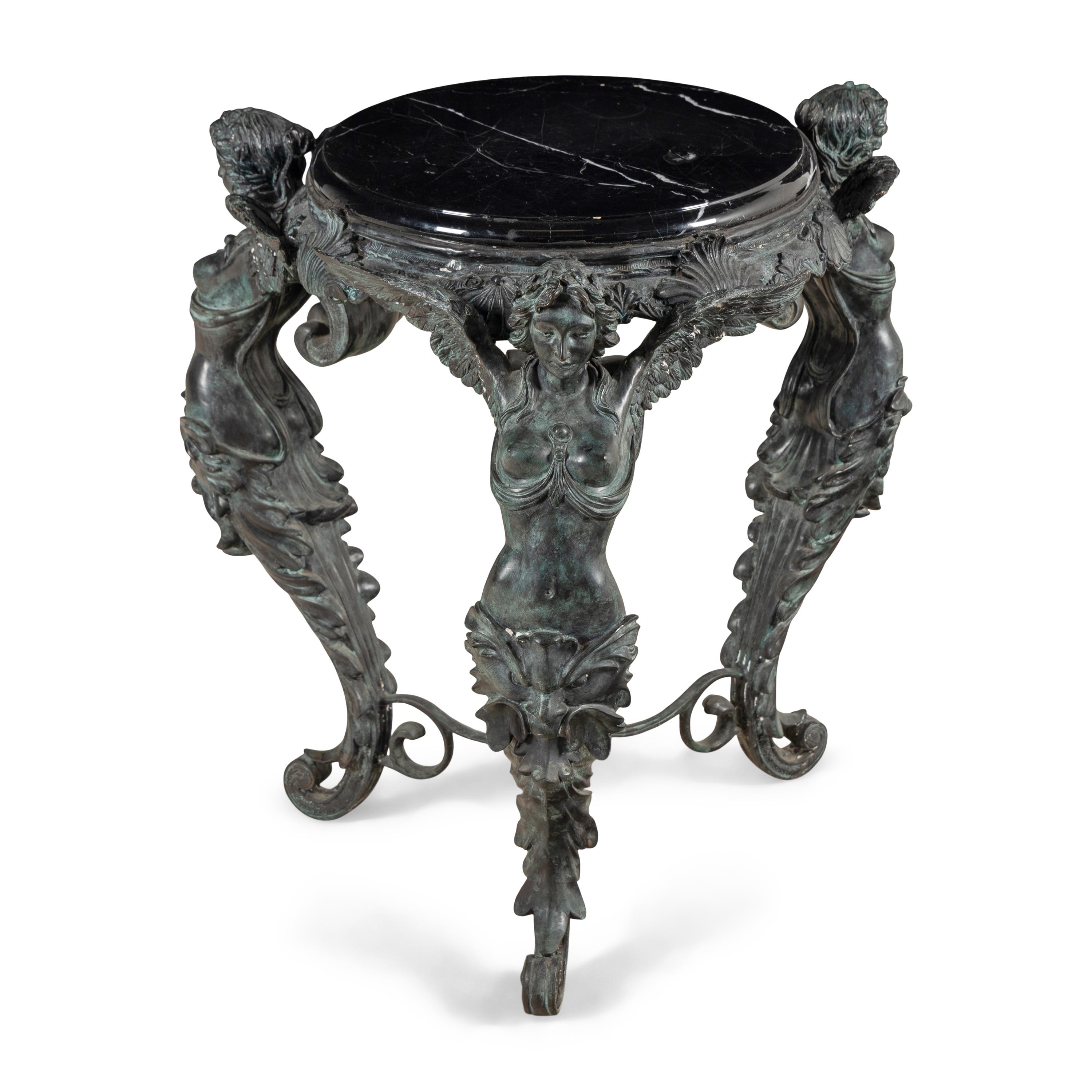A Patinated Bronze and Marble Center Table