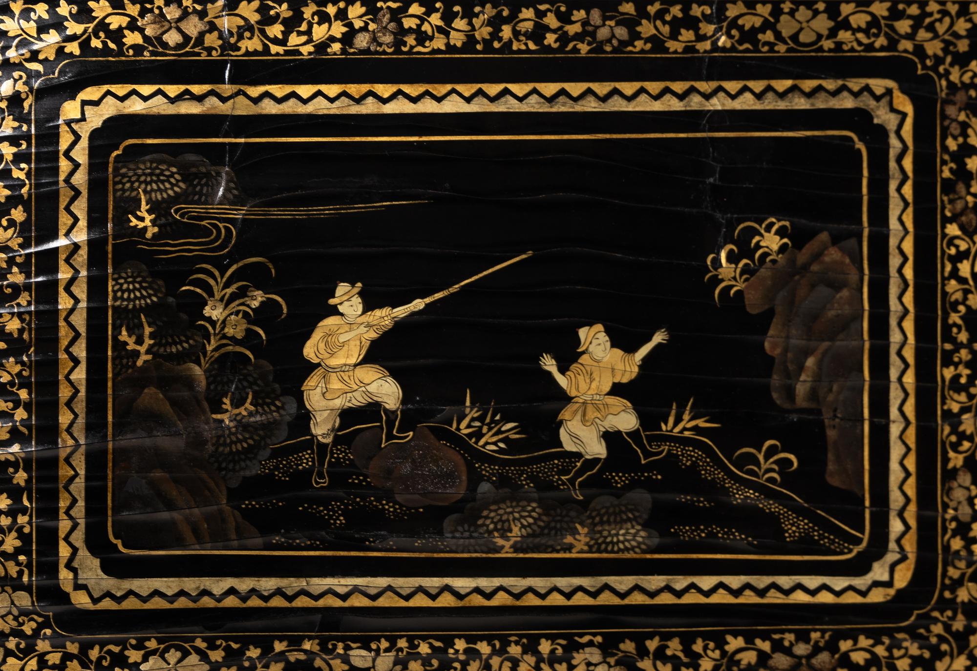 A Chinese Black and Gold Lacquer Eight-Panel Screen
