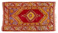 A Turkish Wool Prayer Rug 6 feet 1 inch x 3 feet 6 inches.