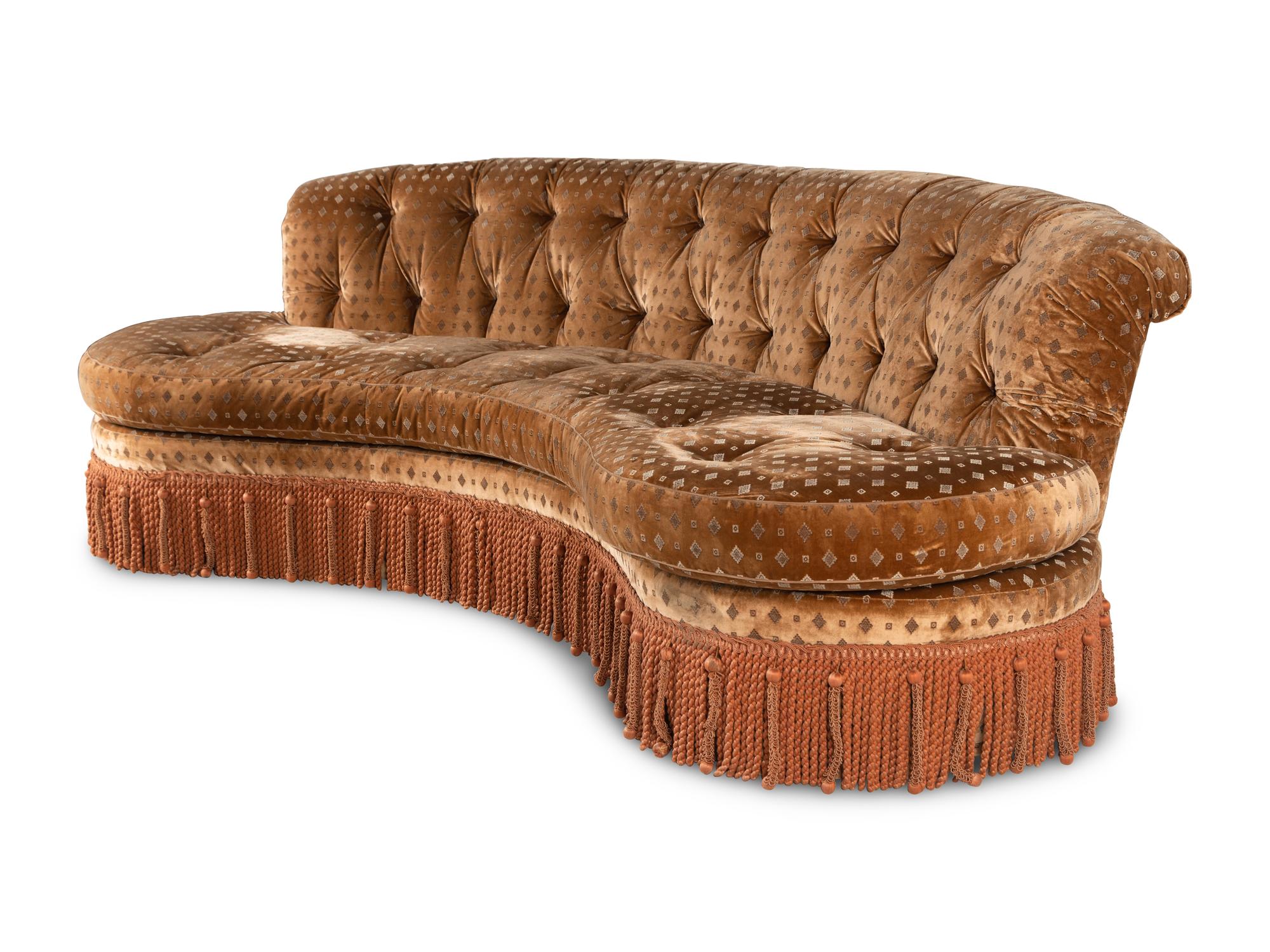 A Button-Tufted Velvet-Upholstered Reniform Sofa with Bullion Fringe