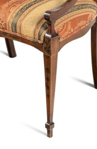 An Edwardian Painted Satinwood Triple-Back Settee and Armchair