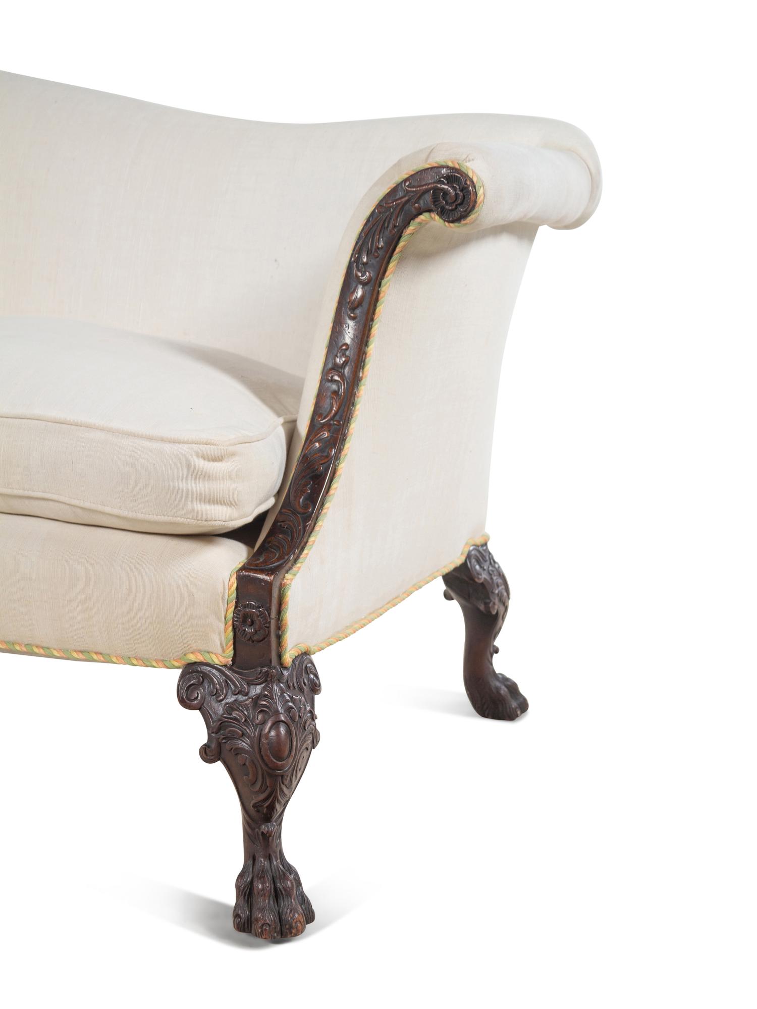 A George I Style Carved Mahogany Camelback Sofa