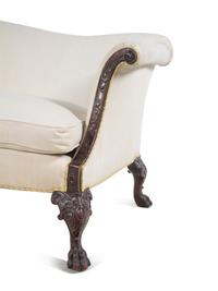 A George I Style Carved Mahogany Camelback Sofa