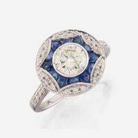 A diamond, sapphire, and white gold ring
