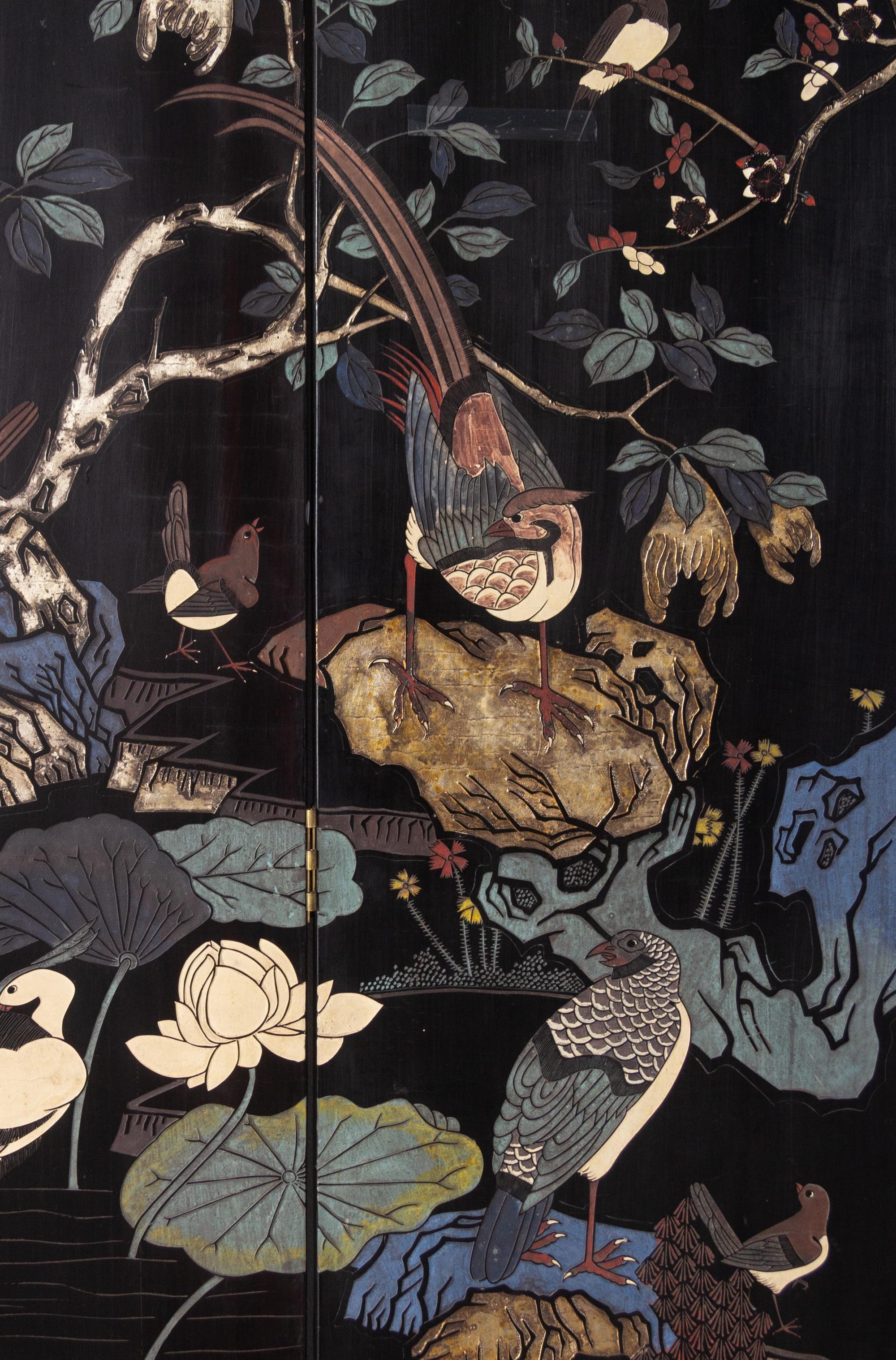 A Chinese Large Eight-Paneled Coromandel Lacquered Floor Screen