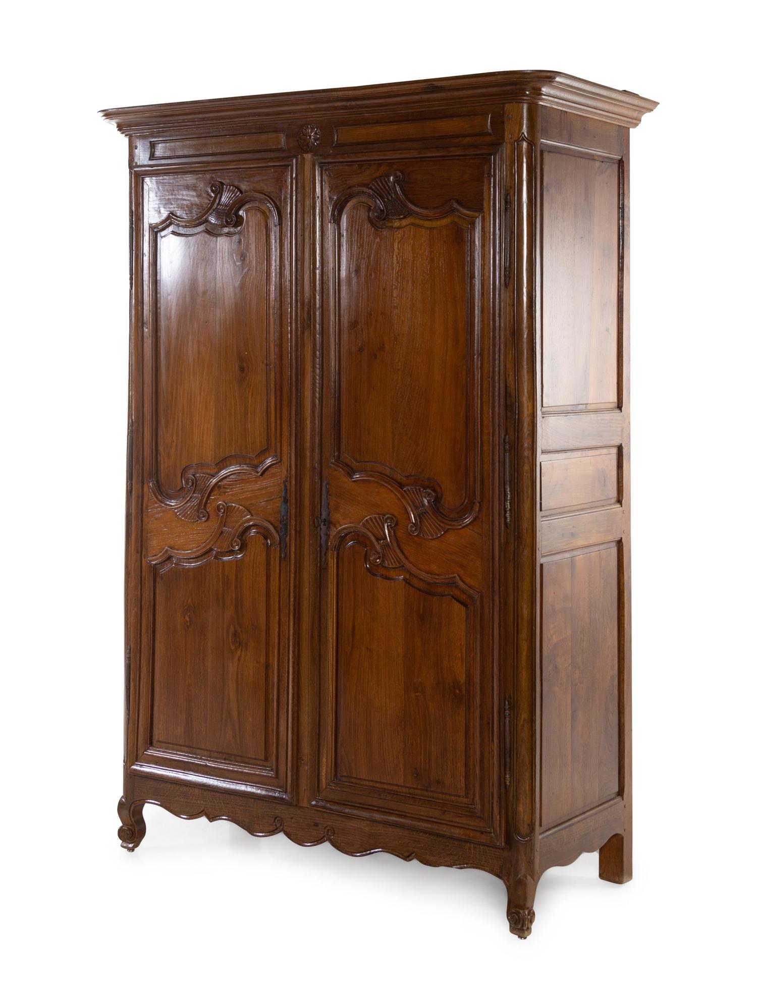 A French Provincial Walnut Armoire