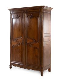 A French Provincial Walnut Armoire