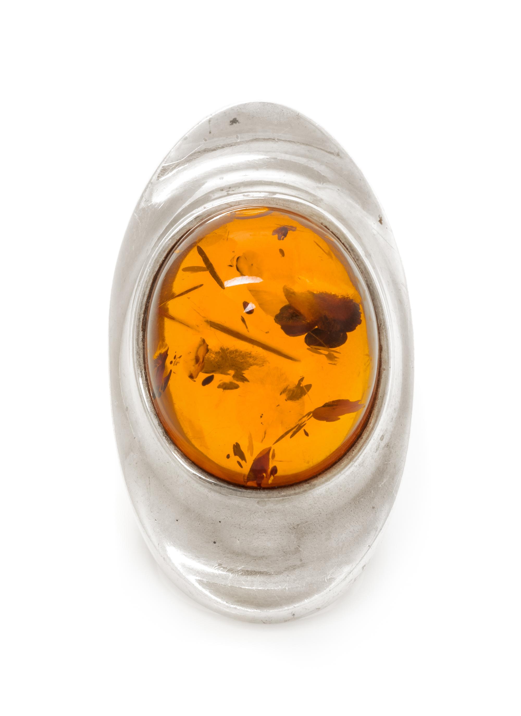 A Modernist Sterling Silver and Amber Ring, Henning Koppel for Georg Jensen, 17.40 dwts.