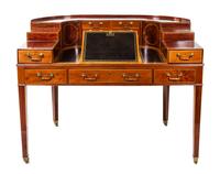 A George III Gilt-Tooled Leather-Inset, Inlaid Mahogany and Satinwood-Banded Carlton House Desk Height 41 x width 53 1/2 x depth 33 inc