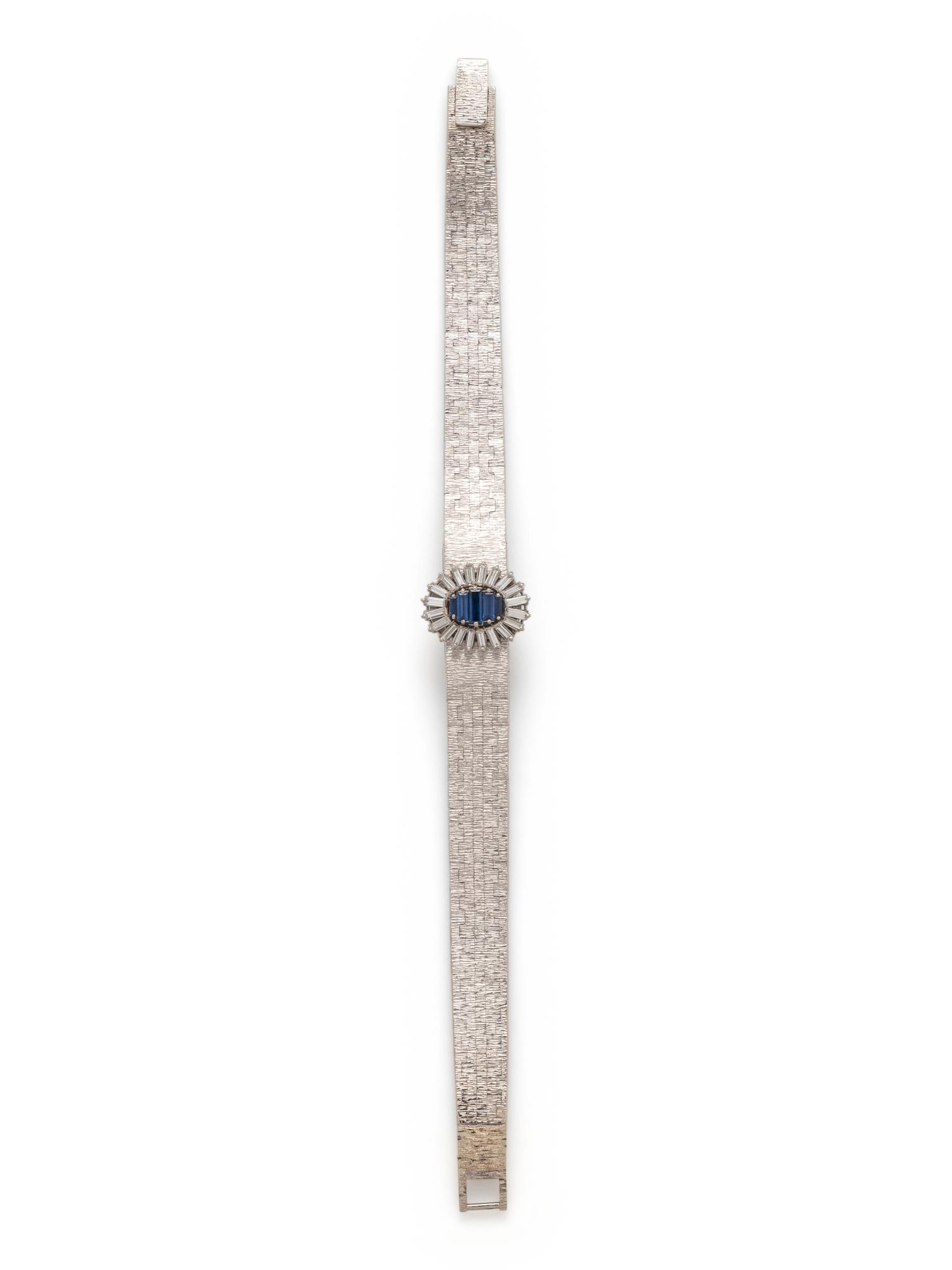 PIAGET, 18K WHITE GOLD, DIAMOND AND SAPPHIRE SURPRISE WATCH