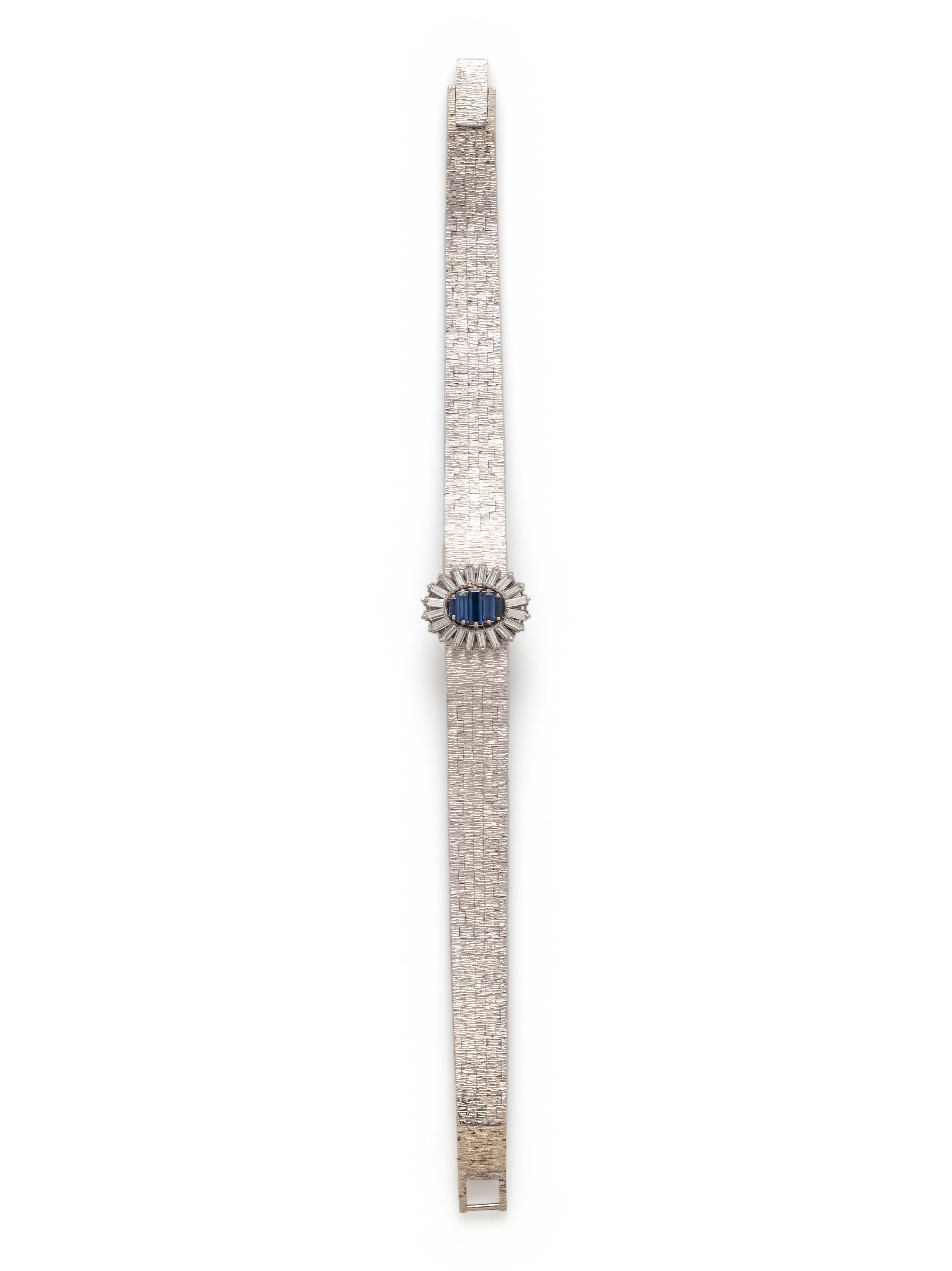 PIAGET, 18K WHITE GOLD, DIAMOND AND SAPPHIRE SURPRISE WATCH