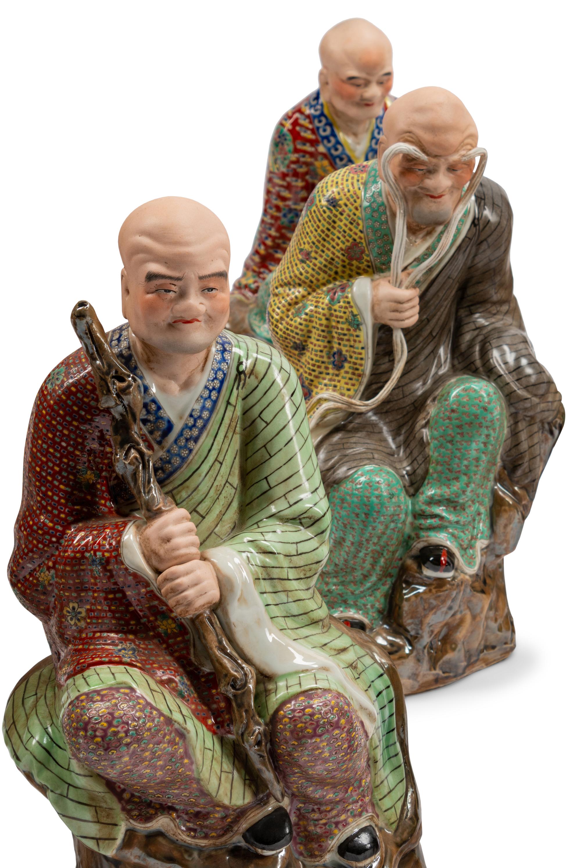 A Set of Eighteen Chinese Export Enameled Porcelain Figures of Immortals