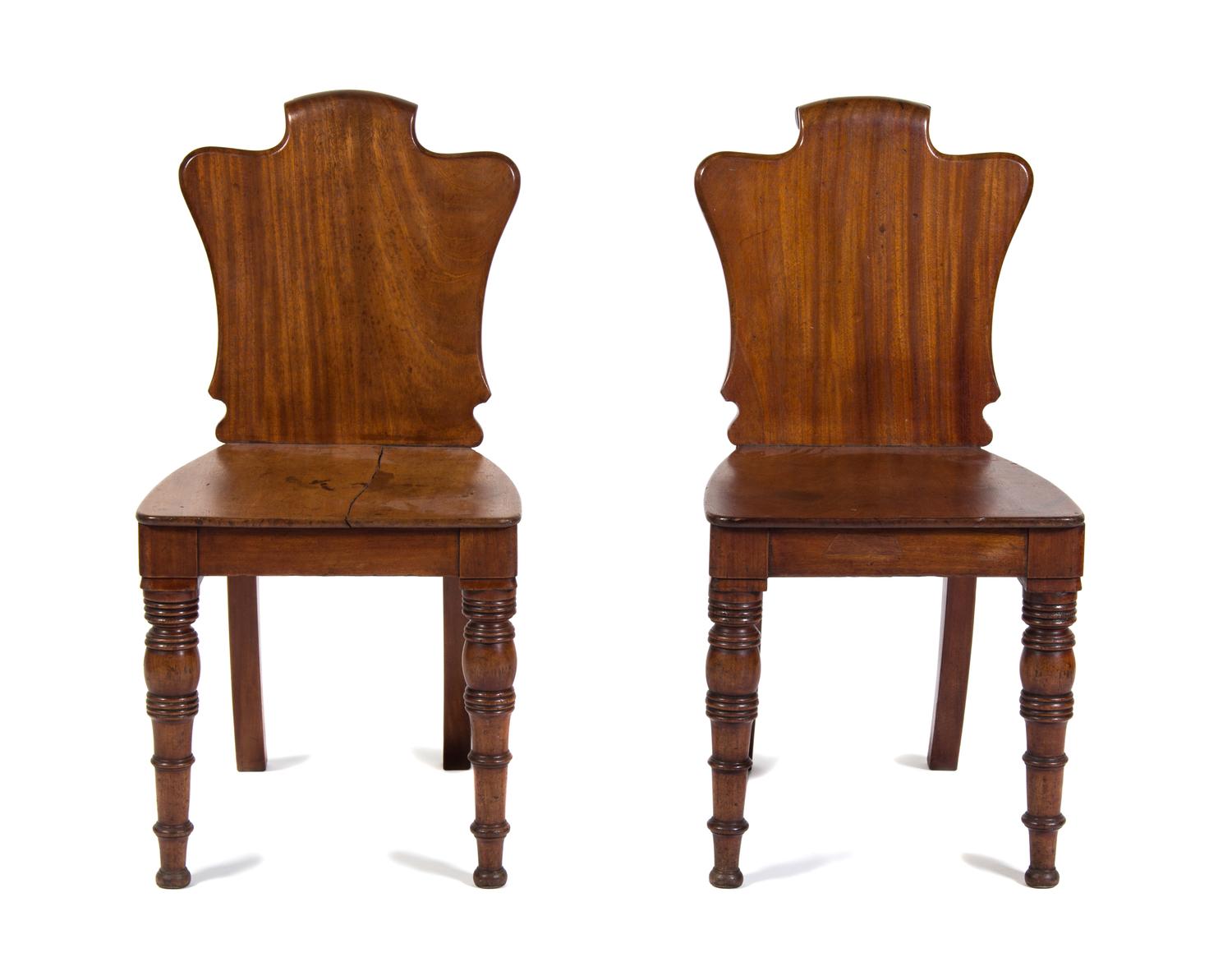 A Pair of William IV Style Mahogany Hall Chairs Height 33 inches.