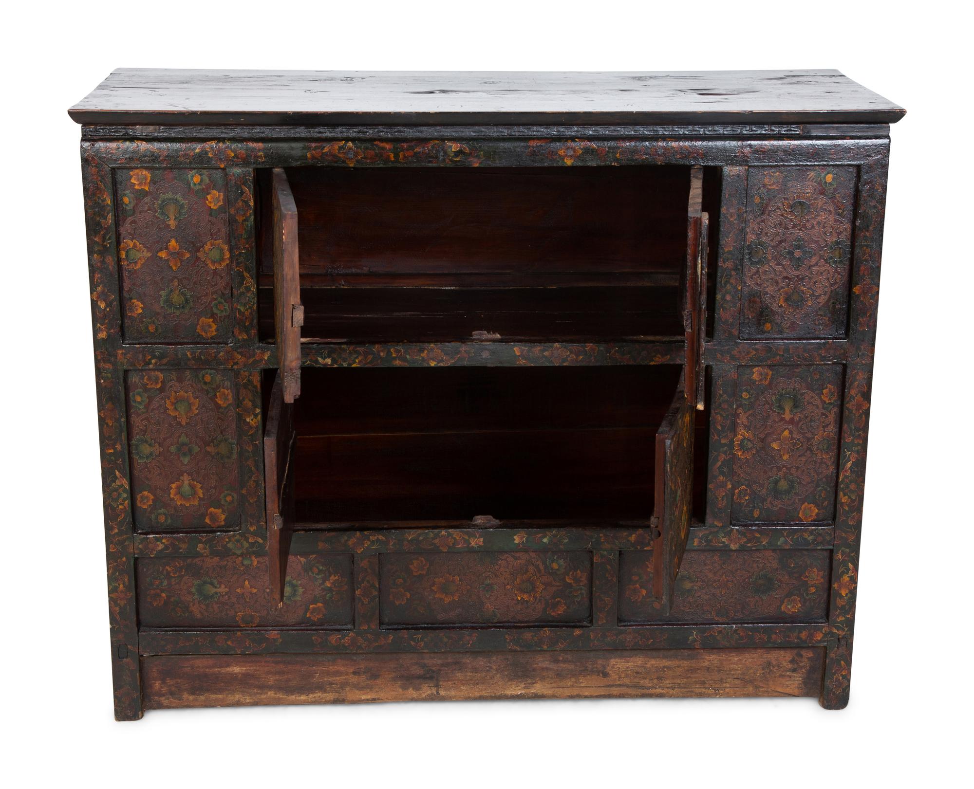 A Tibetan Lacquered and Tooled Pigskin Hall Chest — 20TH CENTURY