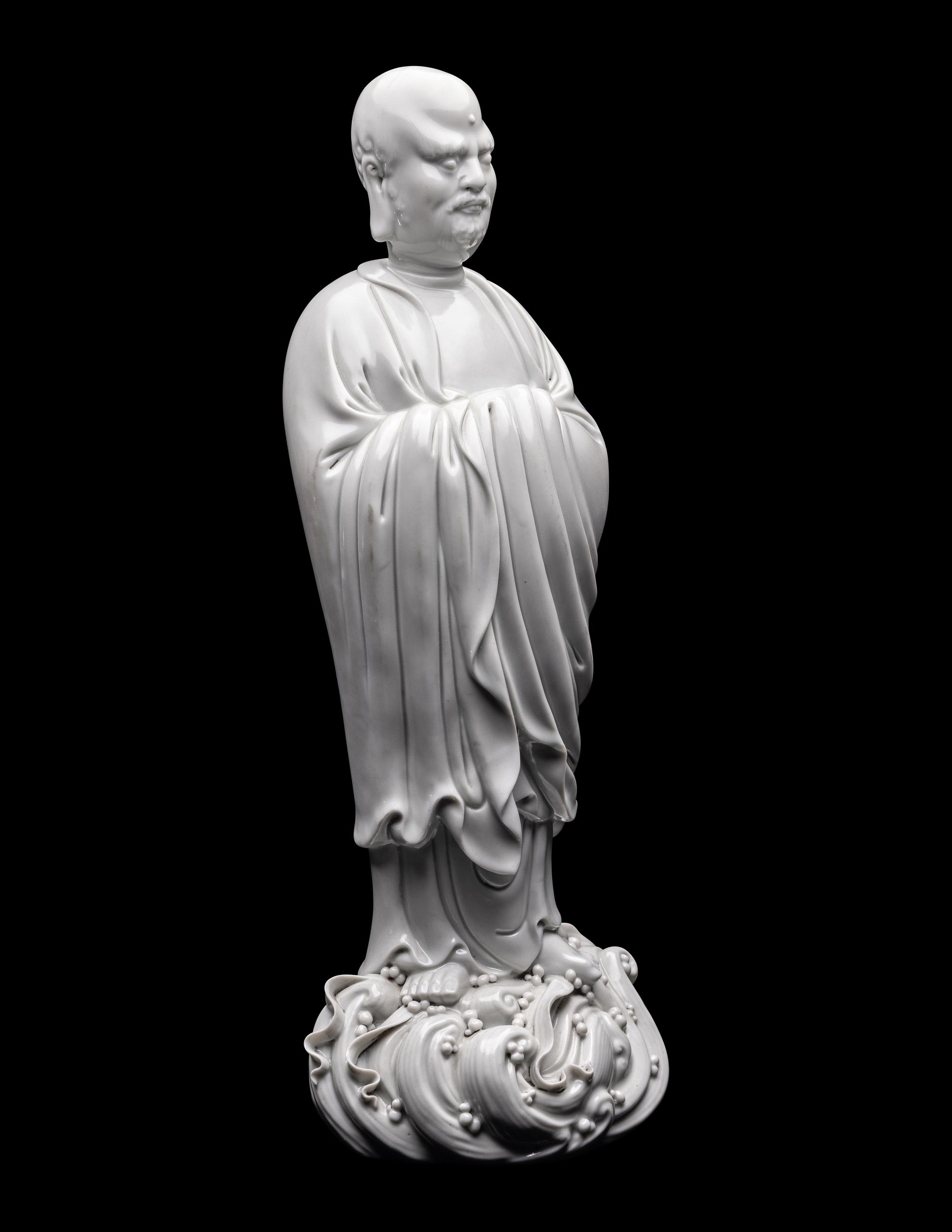 A Chinese Blanc-de-Chine Glazed Porcelain Figure of Damo