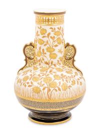 An Aesthetic Movement Gilt Decorated Earthenware Vase