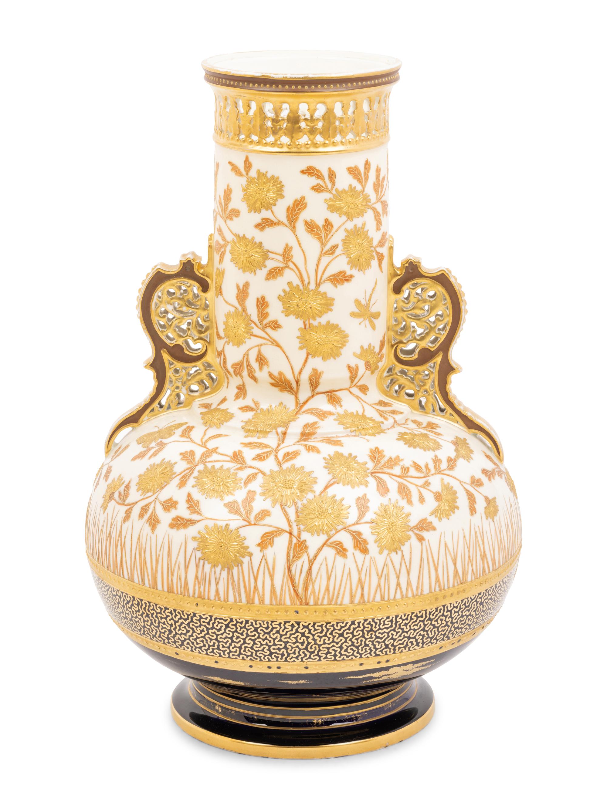 An Aesthetic Movement Gilt Decorated Earthenware Vase