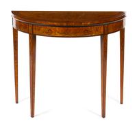 A Sheraton Style Satinwood and Marquetry Flip-Top Game Table Height 30 x width 37 x depth 17 inches (closed). — MID-19TH CENTURY