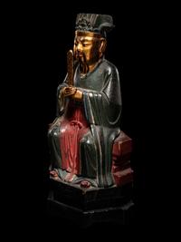 A Chinese Gilt, Red, and Black Lacquered Wood Figure of an Official