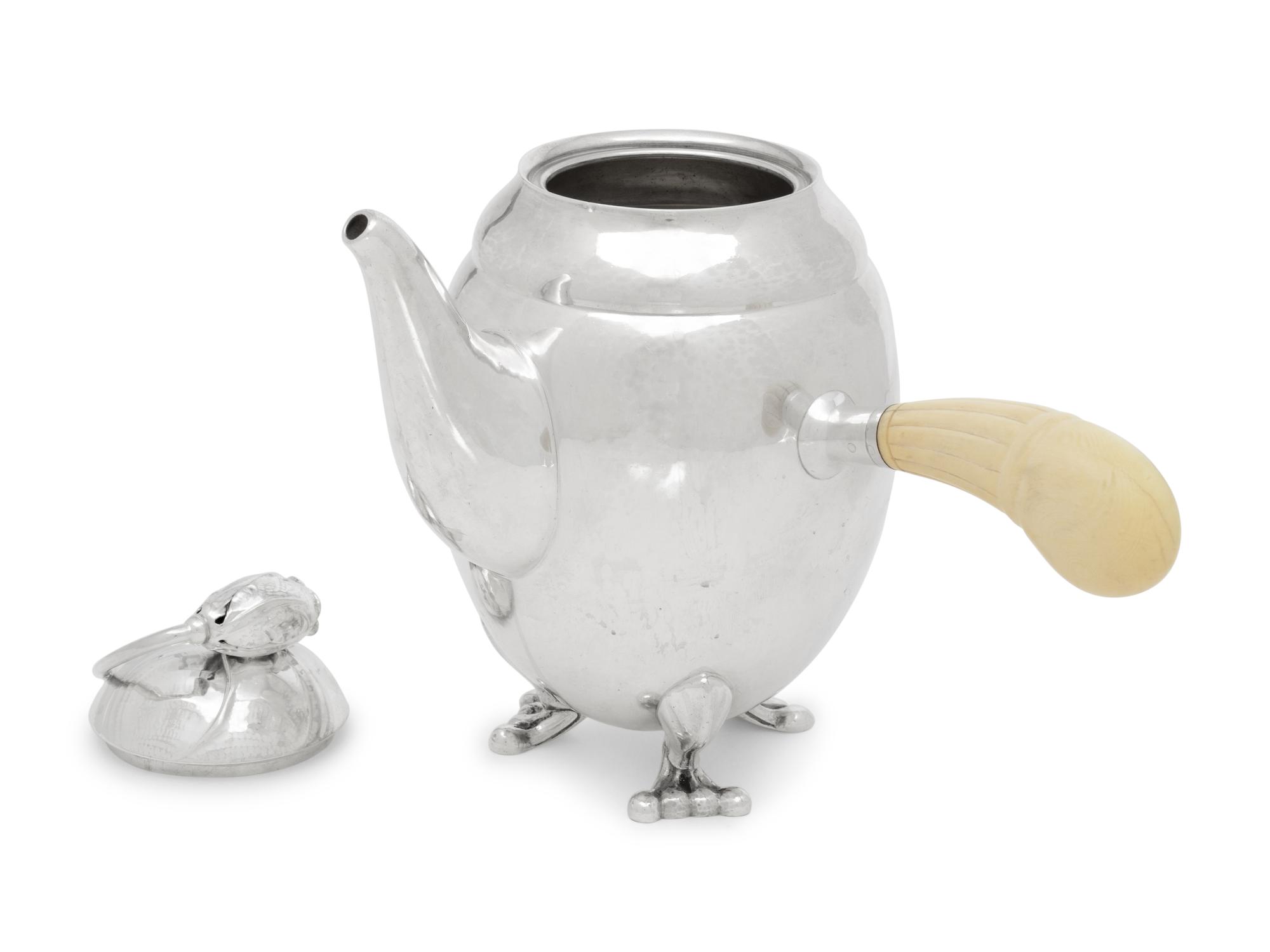 A Georg Jensen Blossom Hammered Silver Chocolate Pot