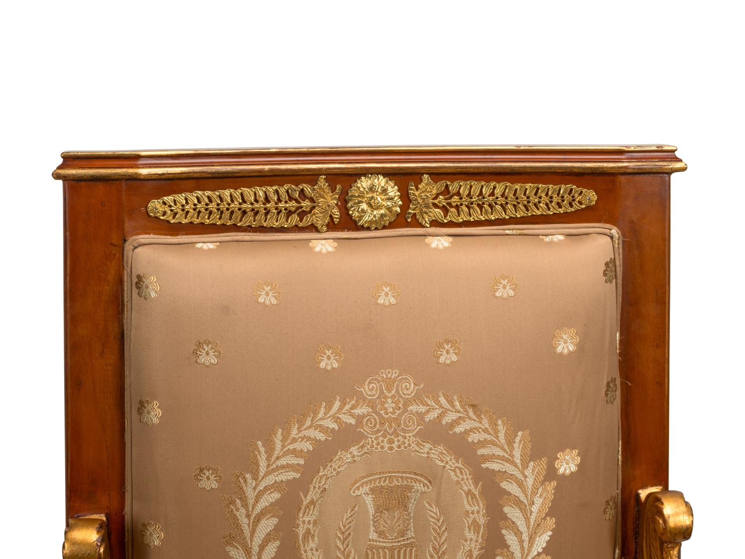 A Set of Four Italian Neoclassical Style Parcel Gilt Armchairs