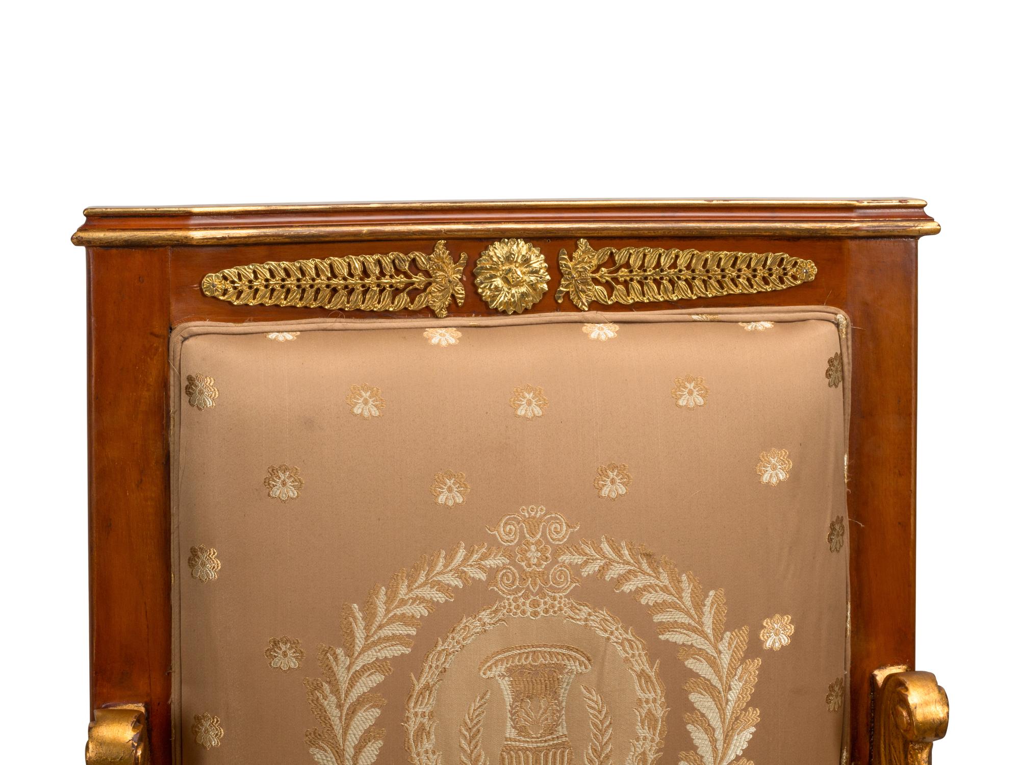 A Set of Four Italian Neoclassical Style Parcel Gilt Armchairs
