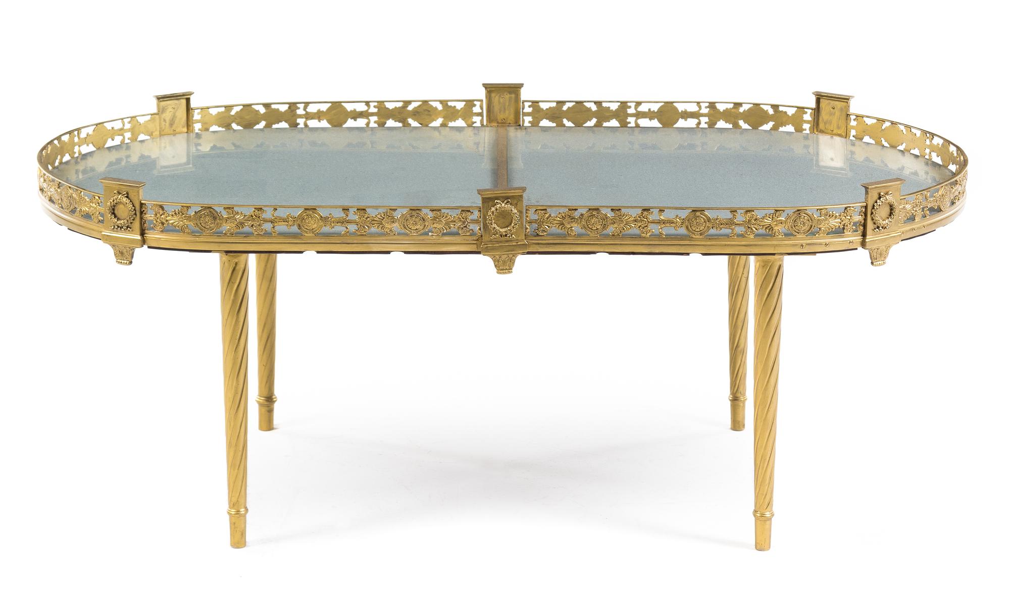 An Empire Style Gilt Metal Low Table Height 17 7/8 x width 44 3/4 x depth 24 3/4 inches. — 20TH CENTURY