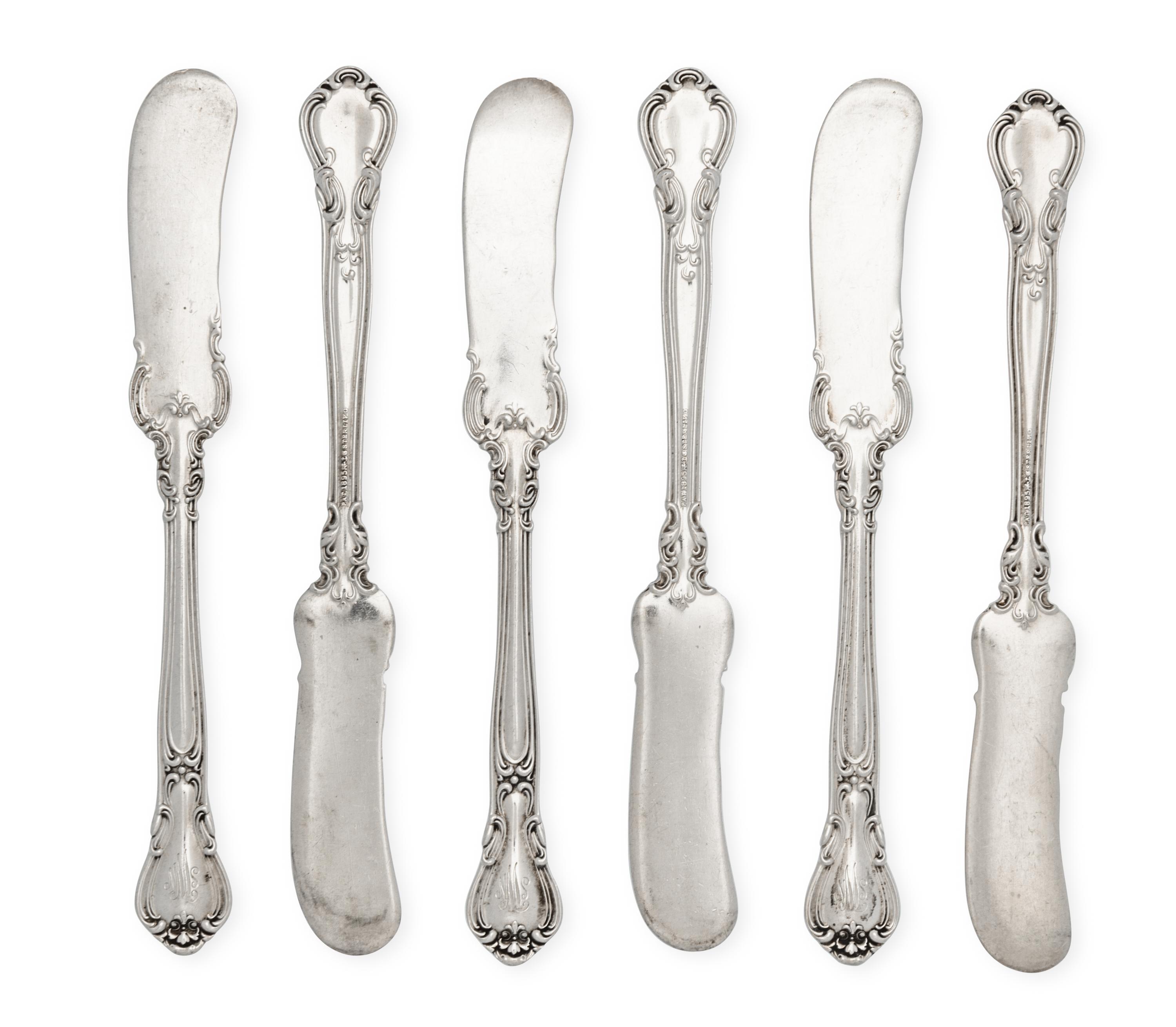 A Set of Twelve American Silver Butter Spreaders, Gorham Mfg. Co., Providence, RI, each with a script monogram SNW.