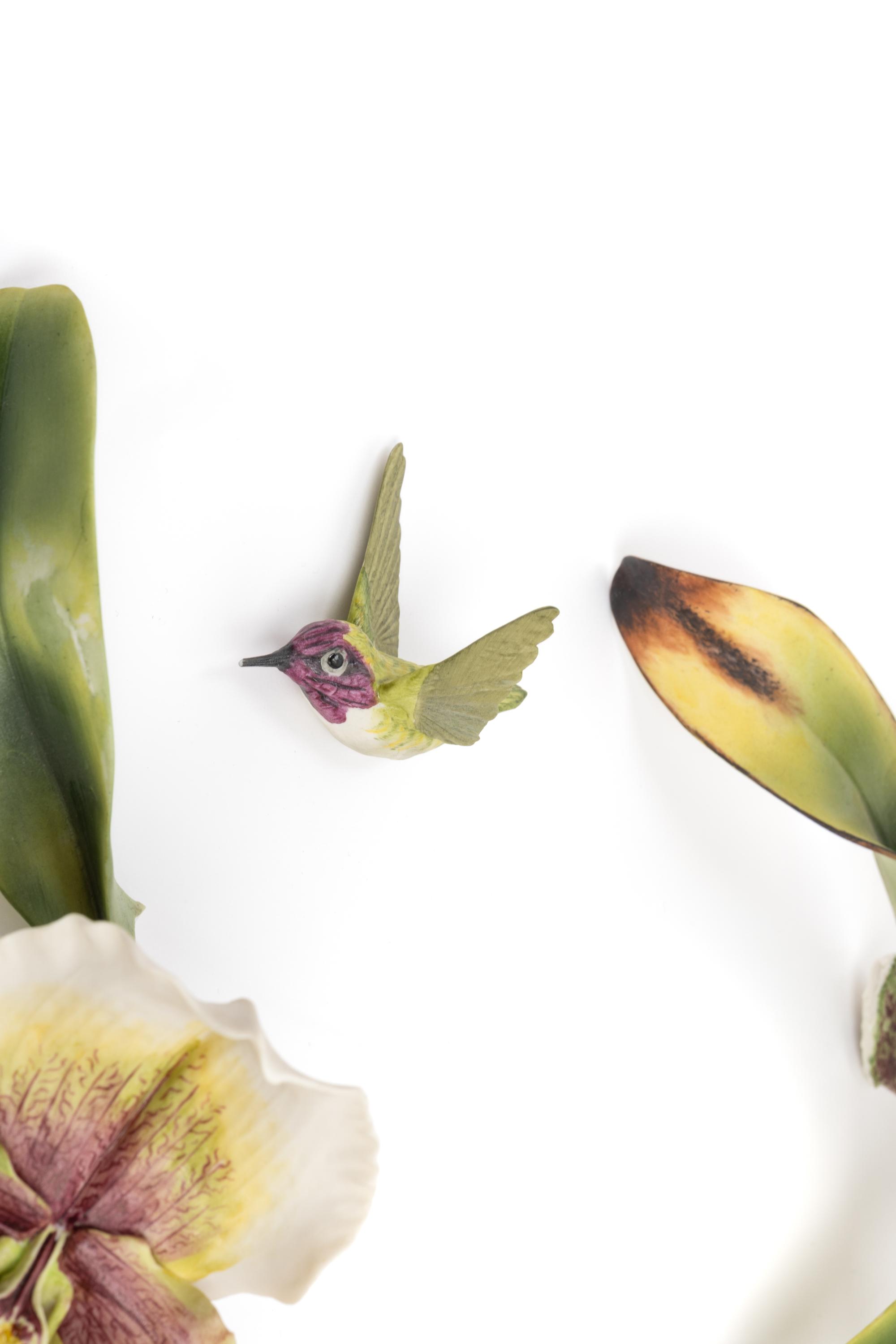 A Boehm Porcelain Orchid and Hummingbird Centerpiece