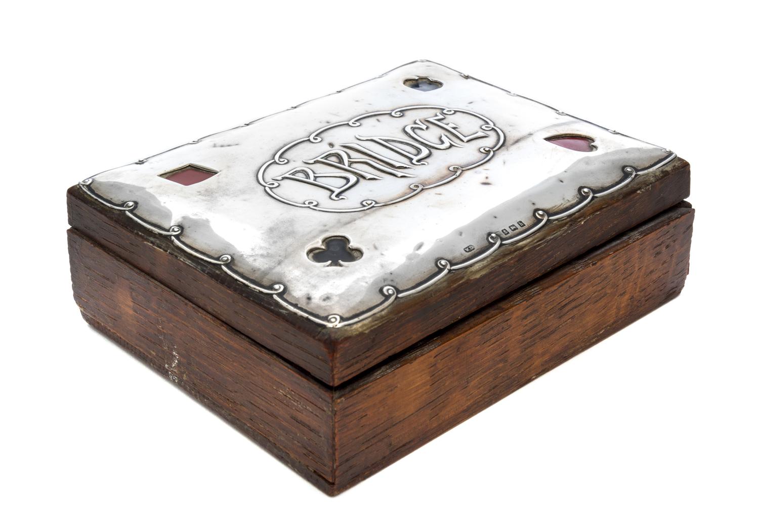 An English Silver Mounted Wood Card Box, William Devenport, Birmingham, 1907, the silver panel bearing a central cartouche marked Bridg