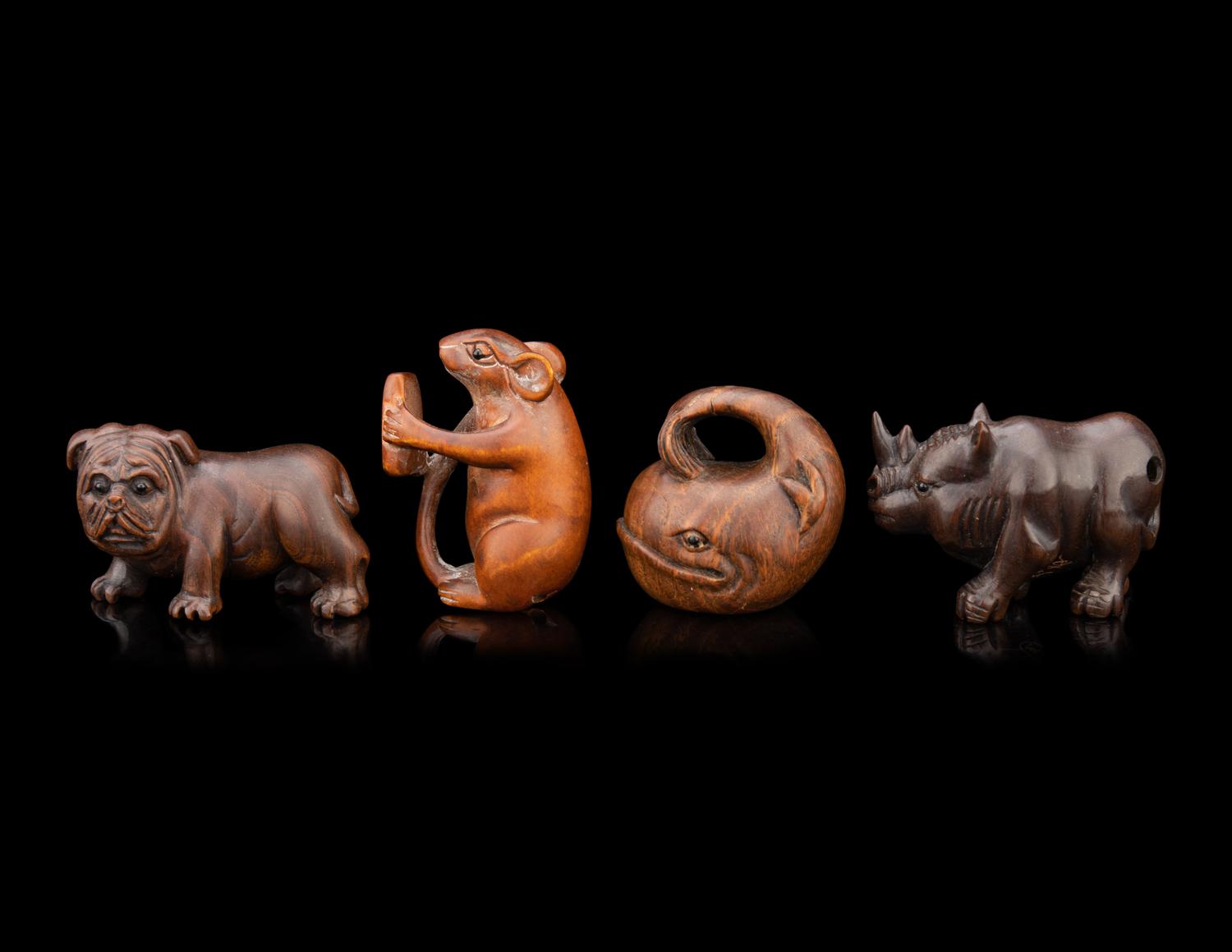 Four Japanese Carved Wood 'Animal' Netsuke