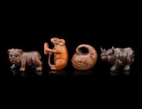 Four Japanese Carved Wood 'Animal' Netsuke