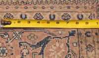 A Tabriz Wool Rug