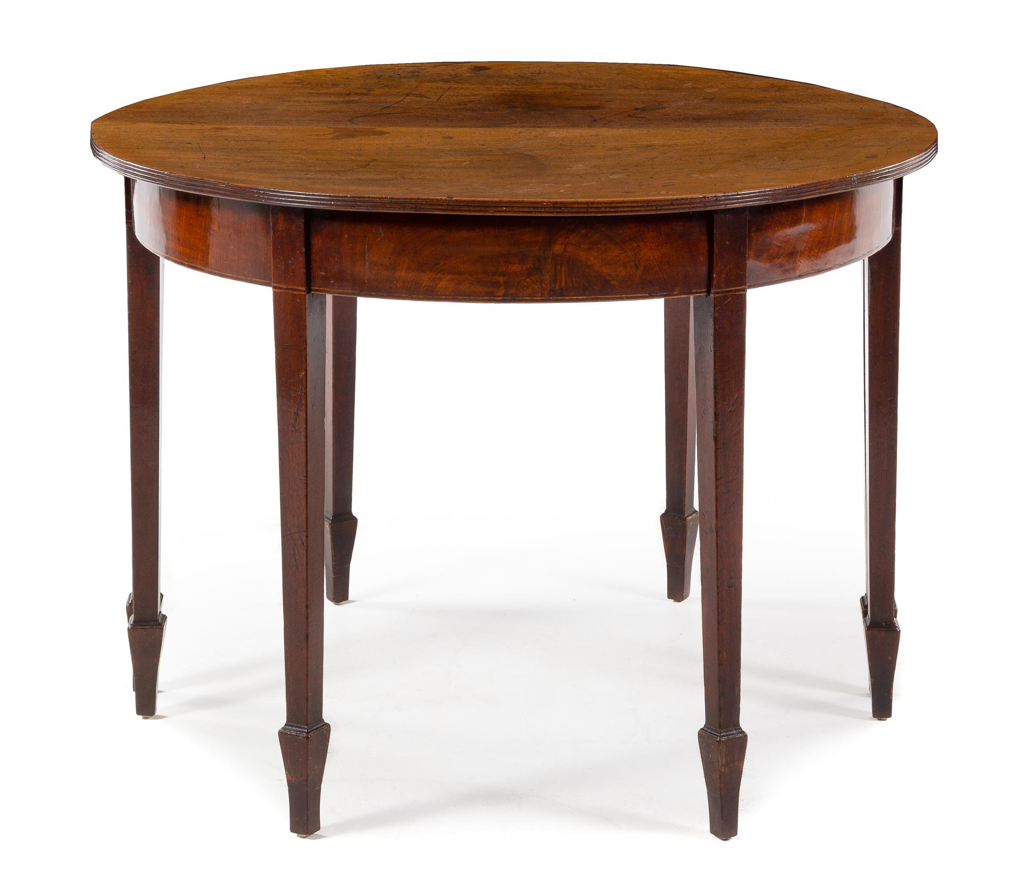 An English Convertible Center Table Height 30 x diameter 41 inches. — LATE 19TH CENTURY