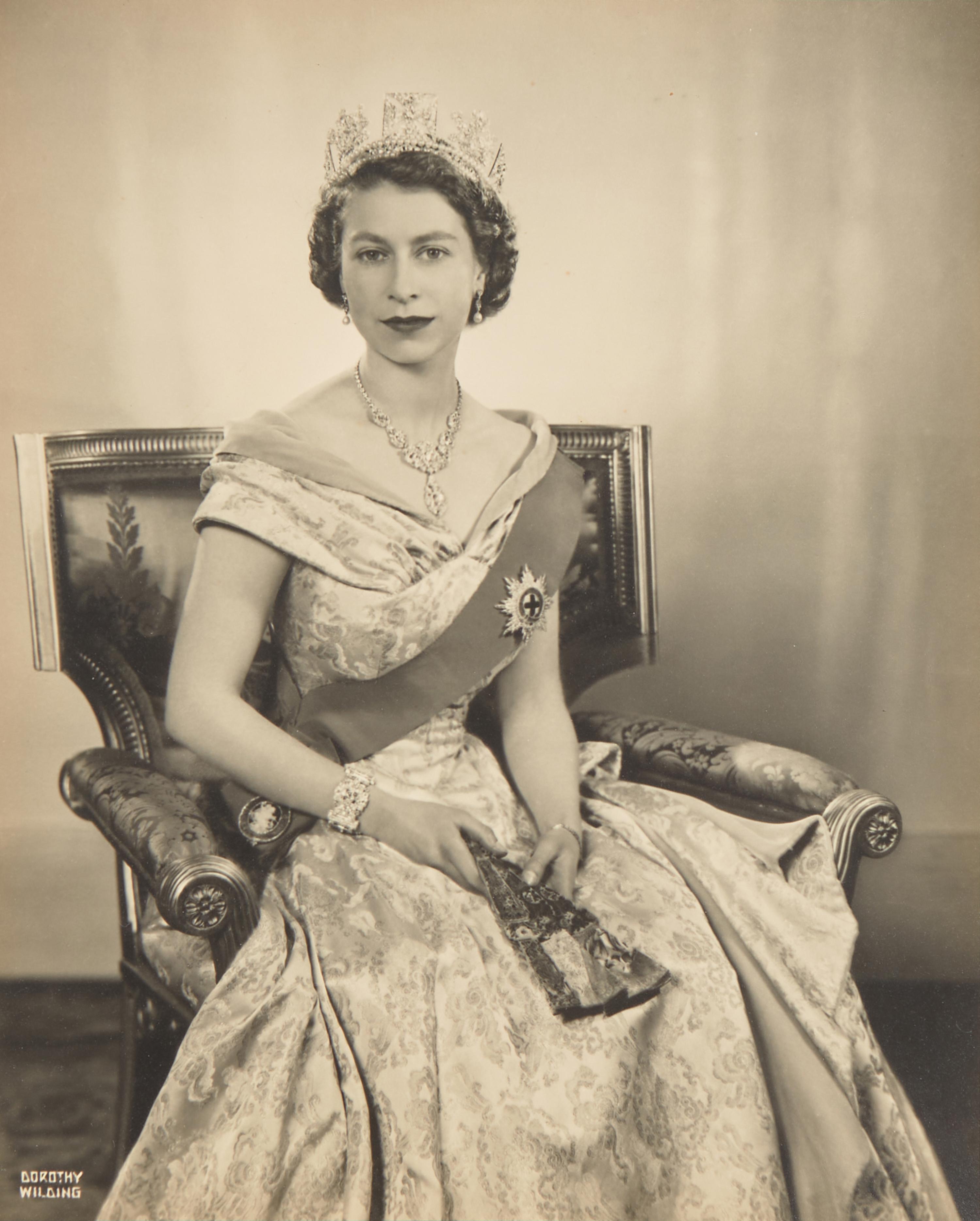 Queen Elizabeth II and Prince Philip. Pair of Signed Photographs