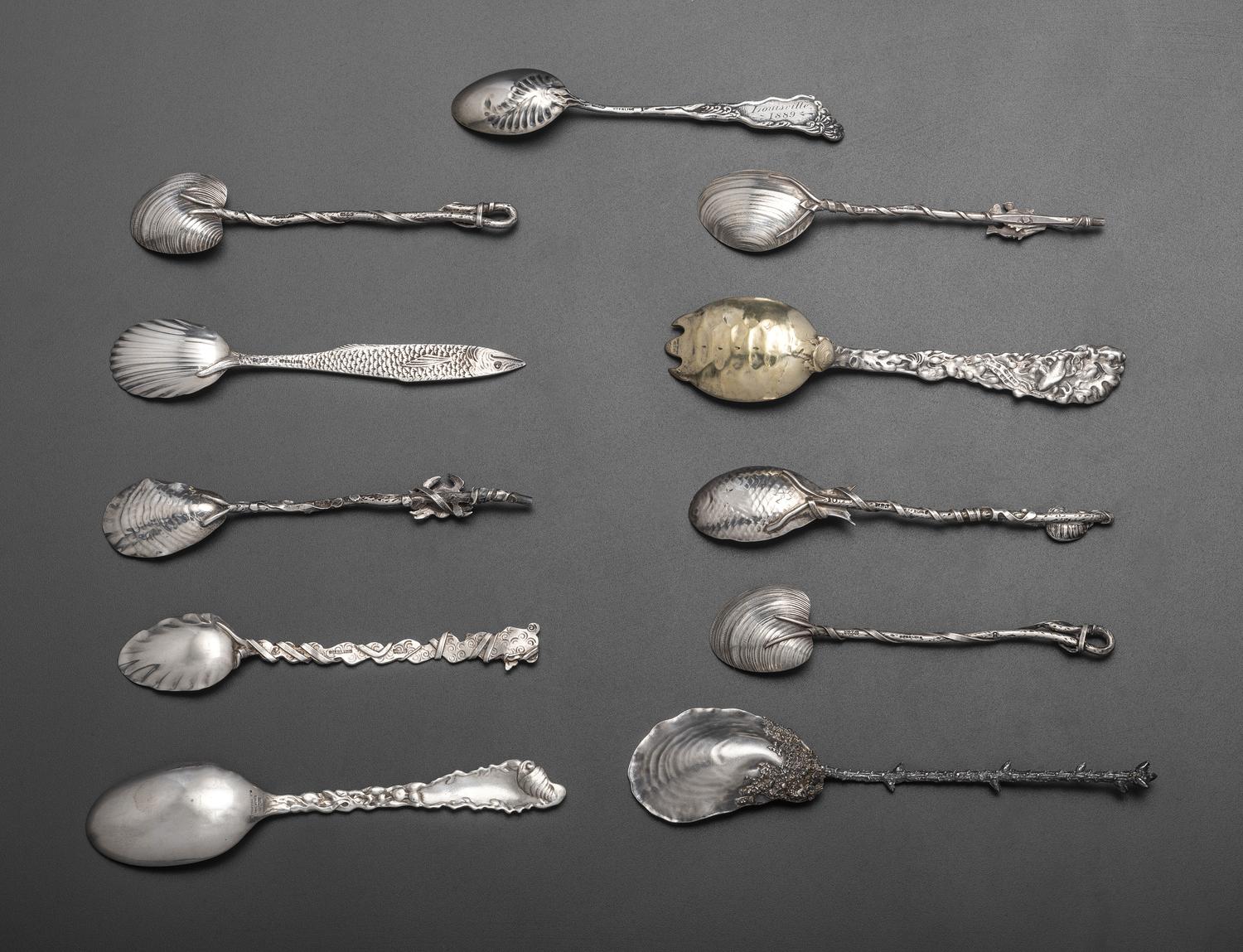 Eleven American Marine Decorated Silver Spoons
