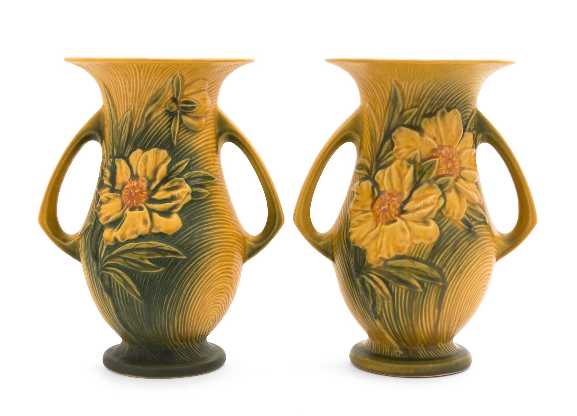 A Pair of Roseville Peony Pottery Vases Height 10 1/4 inches.